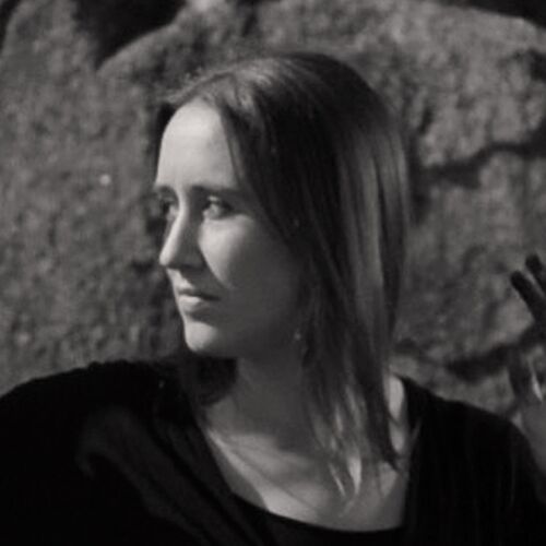 Black and white headshot of Kate Ellis