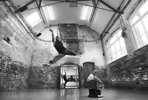 Renako McDonald leaping in the air in the CoisCéim studio