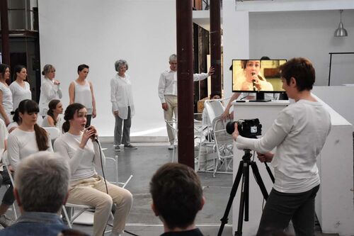 Participants being speaking to camera in performance